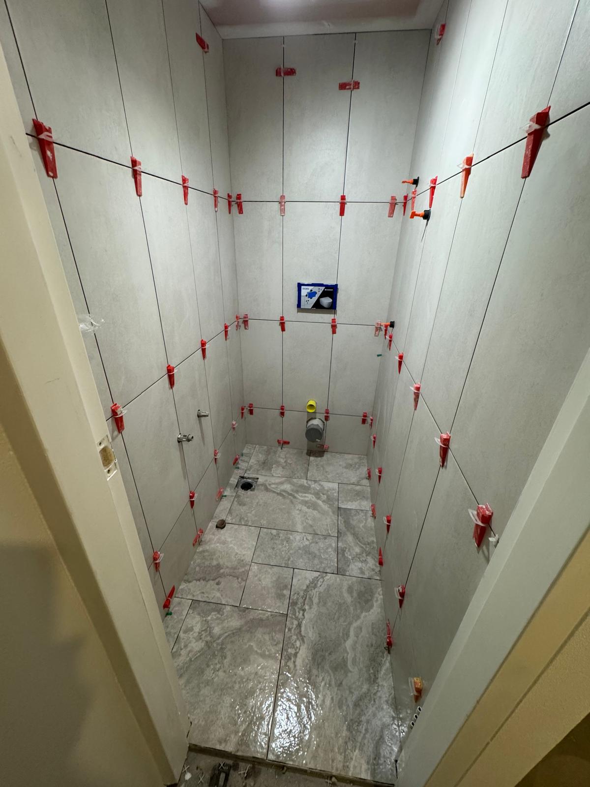 Tiled powder room walls